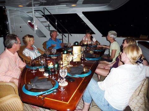 Getting ready for dinner with Capt. Roy and Chief Stew. Stephanie
